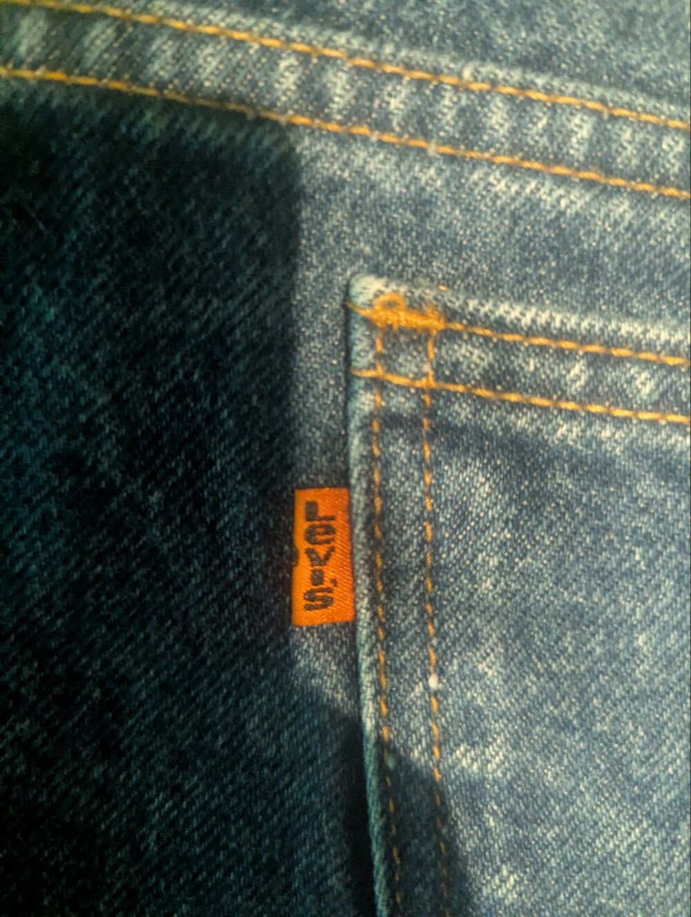 Levi's mid blue jeans with orange tab